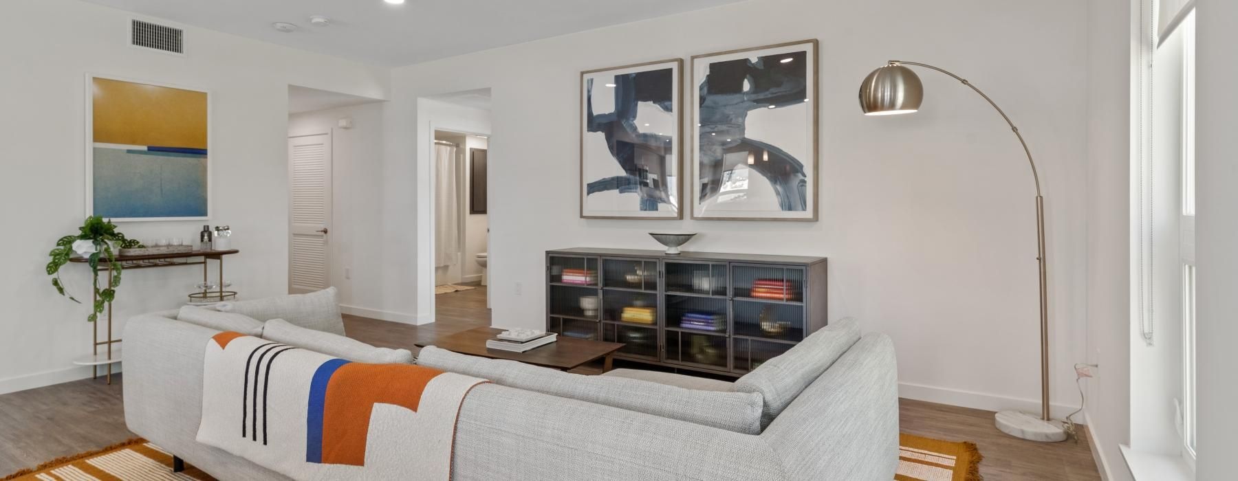 a bedroom with a bed and a tv