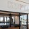 a room with a sign above it and fitness equipment