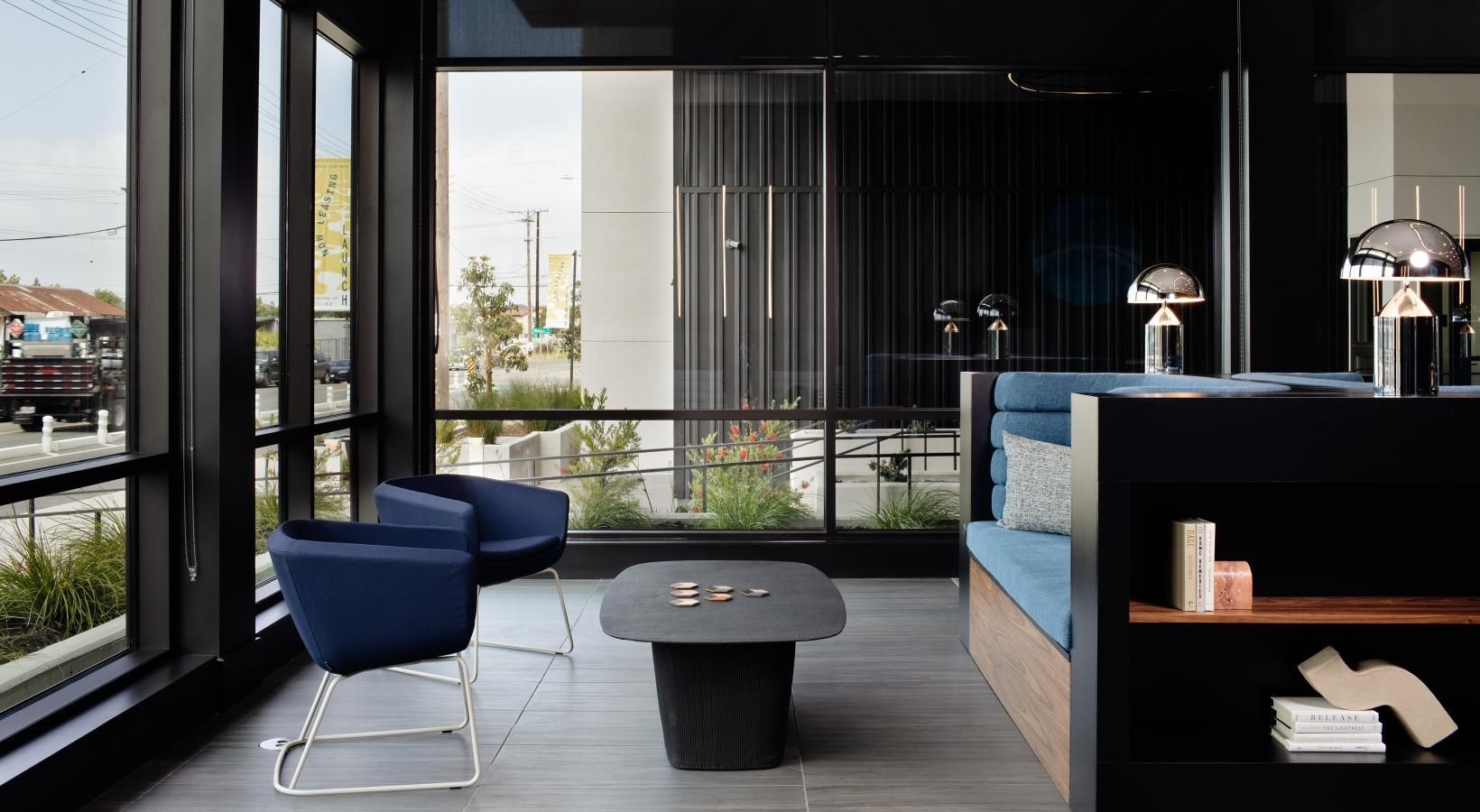 The essence of exceptional living a room with a table chairs and a window with a view of the city