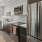 Kitchen with large window and stainless appliances at Launch best apartments in San Francisco.