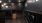 a large room with black cabinets