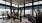 a room with exercise equipment and windows