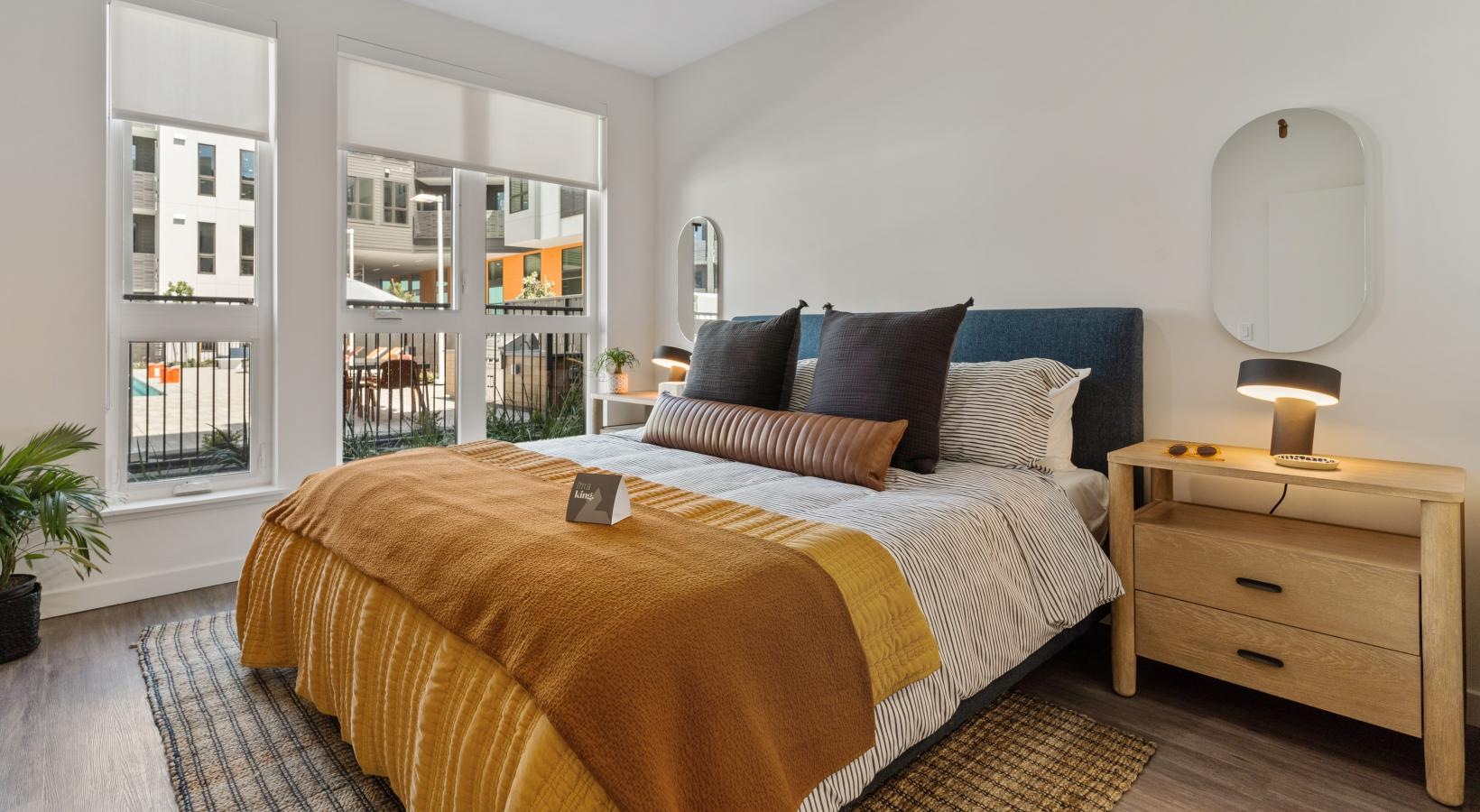 Relax and recharge in beautiful and spacious bedrooms a bedroom with a large bed