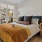 a bedroom with a large bed