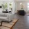 a large living room with a large white couch and a table